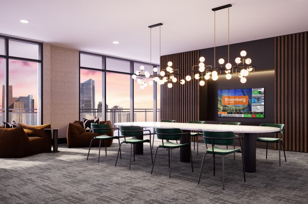 Clubhouse in the evening with designer lighting, flat screen TV, variety of seating, and floor to ceiling windows overlooking downtown