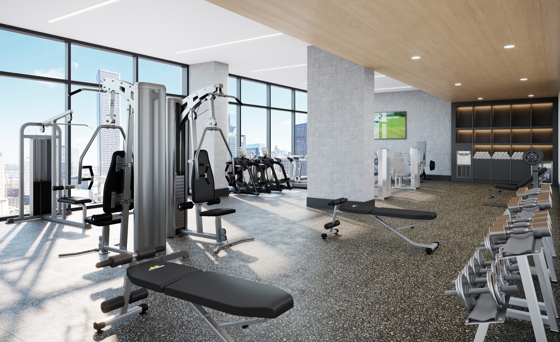 Fitness center with free weights, strength machines, cardio equipment and floor to ceiling windows with downtown views