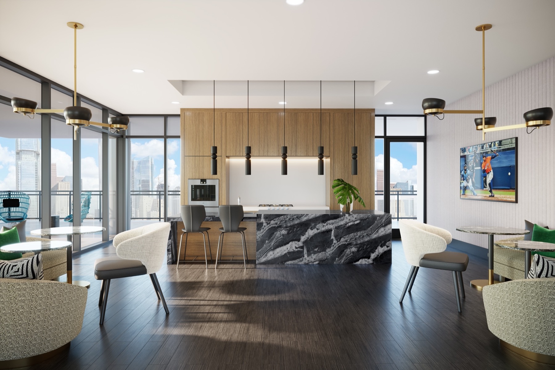 Clubhouse kitchen area with bar seating, gas grill, oven, and seating with a flat screen TV